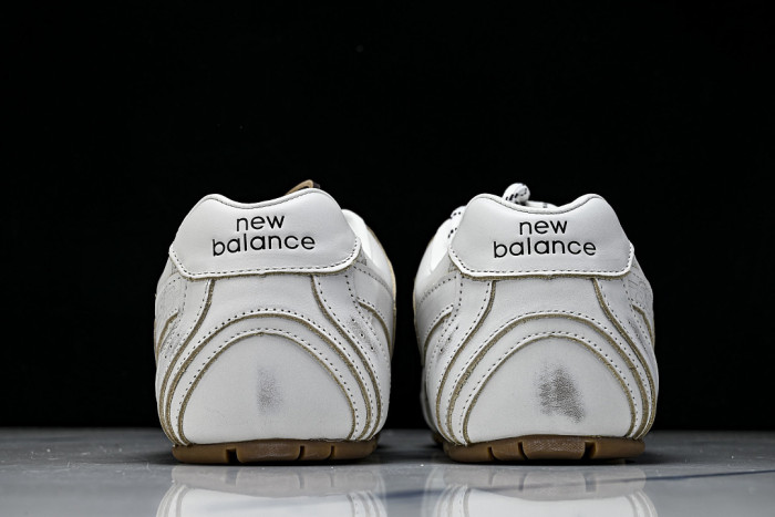 M*u M*u x New Ba1an*e Leather Sneakers UM001